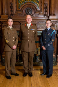 Air and Army Cadets with military officer