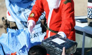 Father Christmas Distributes Presents to Soldiers
