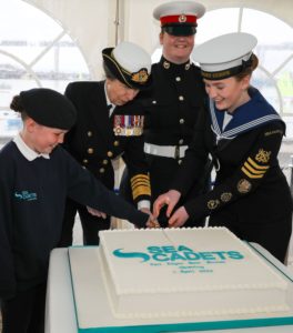Princess Anne cuts cake with Sea Cadets