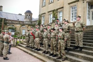 Cadets listen to Lady Glenconner on the steps of Dumfries House