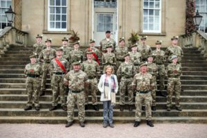 Cadets pose with Lady Glenconner on the steps of Dumfries House