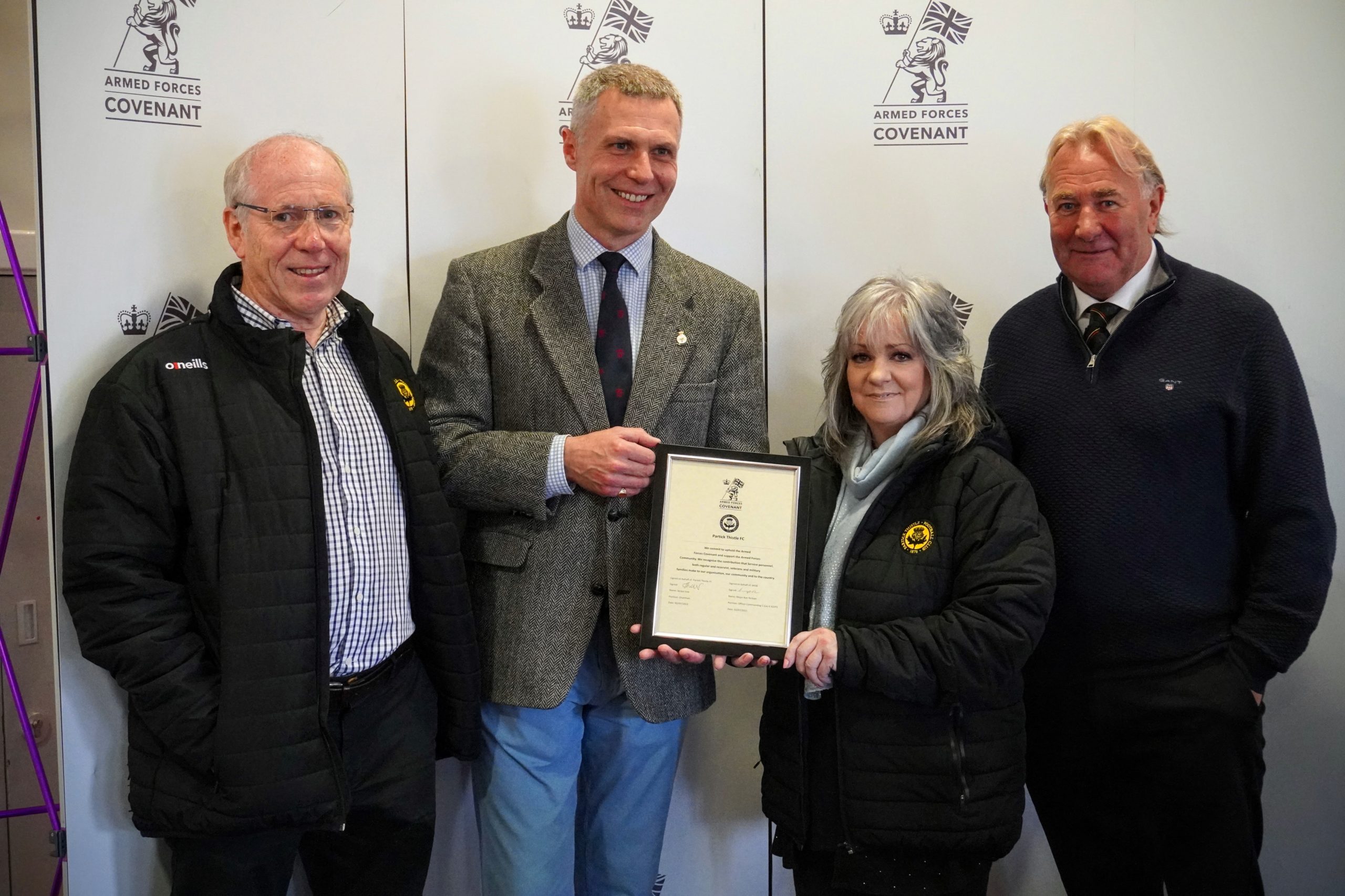 Left to right: Club Director Douglas Noble, SSAFA Events Officer Allan Steele, Club Chairman Jacqui Low and former Partick Thistle goalkeeper Alan Rough MBE.