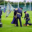 Members of RAF Reserves kneel to receive Colours