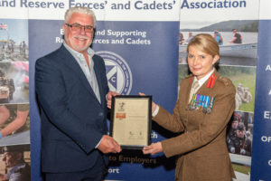 Mike Stewart receiving the Bronze ERS Award from Brigadier Gill Wilkinson