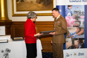 Deputy Lieutenant Easson presenting certificates to Reservists and CFAVs