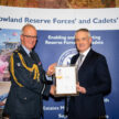 HNS Scotland's John Burns receiving the Gold ERS Revalidation from Air Officer Scotland