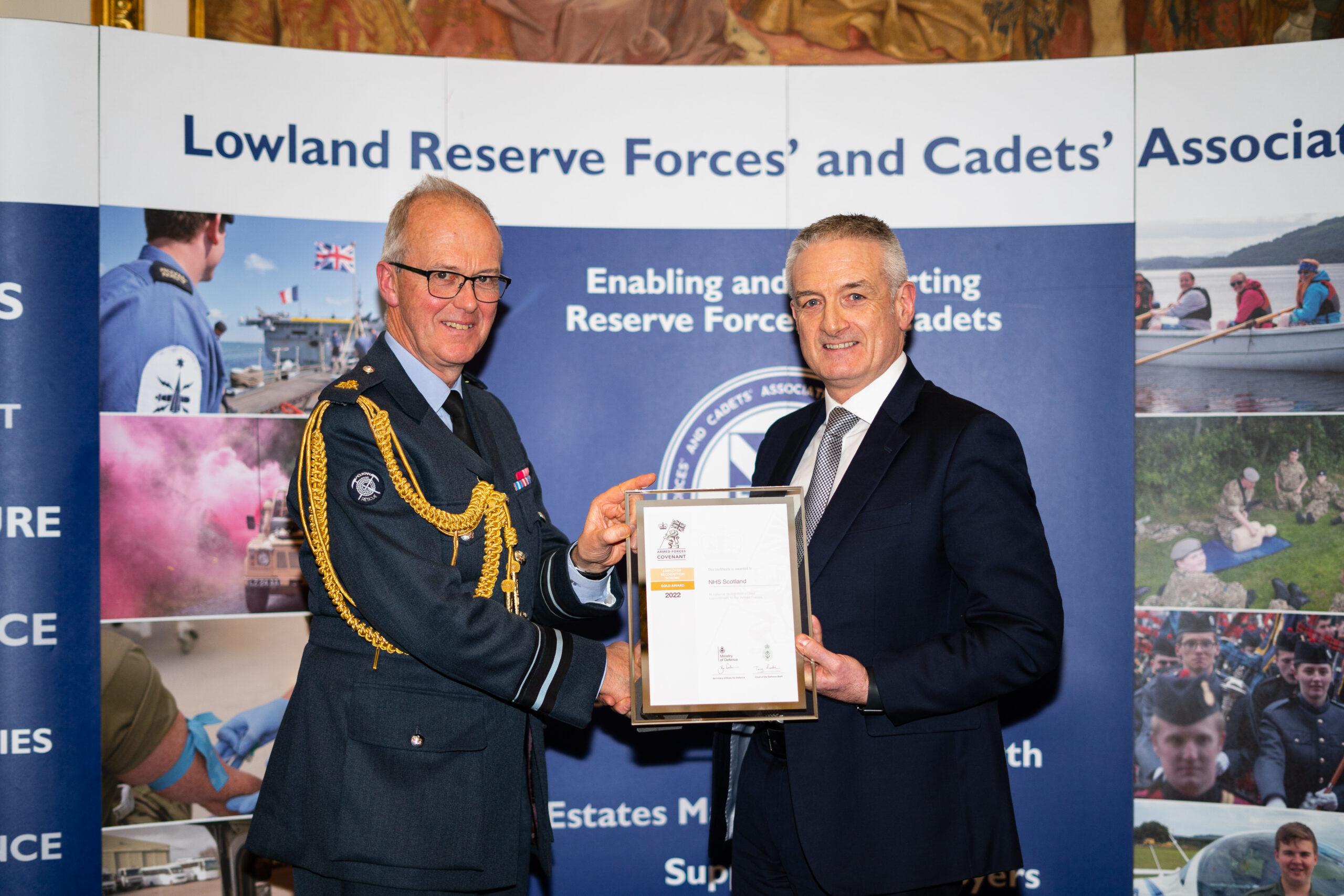 HNS Scotland's John Burns receiving the Gold ERS Revalidation from Air Officer Scotland