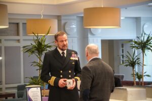 HMS Dalriada's Commander Michael Howarth chatting with former Lowland RFCA Chief Executive Colonel Robbie Gibson