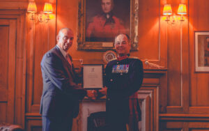 Armed Forces Covenant signing grip and grin