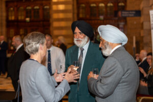Charanjit Singh and Dilbag Singh Sandhu (right) speaking with Lowland RFCA President Moira Niven MBE