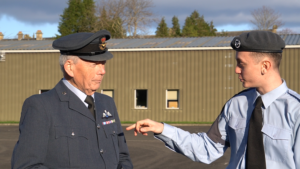Squadron Leader Tom Gray and Cadet Flight Sergeant Jack Edwards exchanging a few words on the parade grounds of Artillery House, Colinton Road Barracks