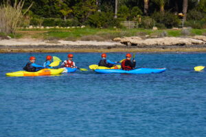 Regulars and Reservists kayaking in the water at Dhekelia.