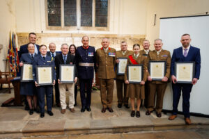 Group photo after the awards ceremony with the award recipients, Lord-Lieutenant Colonel Peter McCarthy, Colonel Brian Johnston and Lowland RFCA Chair Captain Andrew Cowan.