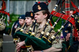 A young Cadet playing the bagpipes during rehearsals for the Beating Retreat