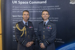 Air Vice-Marshal Munro and Air Vice-Marshal Paul Godfrey pose for a group photo at 602 (City of Glasgow) Squadron Space Flight Launch event.